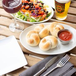 Carolina's Italian Restaurant - Enjoy our Garlic Knots and the nice weather.