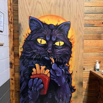 Wiley Roots Brewing Company - a black cat smoking a cigarette - Breweries Near Me - Greeley, Colorado Wiley Roots Brewing Company - a black cat smoking a cigarette - Breweries Near Me - Greeley, Colorado