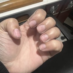 Amore Nail Spa - What it looked like after she took what she thought was acceptable off!