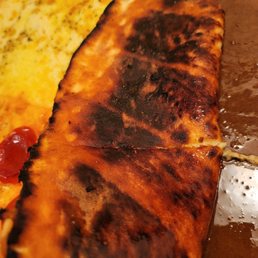 This is burnt Pizza to me because I'm the customer and I asked for it not to be cooked this way.  2nd time in a row this happened.