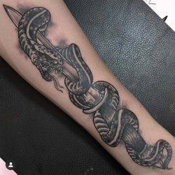 Valhalla Tattoo and Piercing - Neo-traditional snake and dagger tattoo