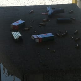 My station. A 9mm Springfield and a bunch of spent ammo