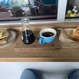 Pourover and sausage, bacon, cheese, and egg muffin