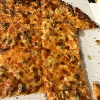 Angelo's Pizza - a half eaten pizza in a box - Pizza Near Me - Downers Grove, Illinois