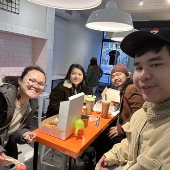 Chungchun - a group of people sitting at a table - Korean Near Me - Quebec City, Quebec