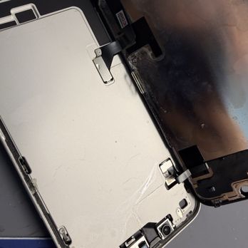 Phone Heaven - Water damage inside iPhone 14. They cleared it out and replaced the screen. - Mobile Phone Repair Near Me - Santa Clarita, California