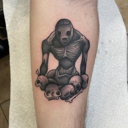 A tattoo of a Redead, a zombie like creature from Zelda, that Daphne did