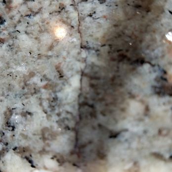 Stone, Inc. - Crack in front of sink.  Goes through the granite - Building Supplies Near Me - Framingham, Massachusetts
