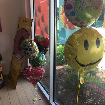 Edibles Arrangements - a smiley face balloon with a happy face balloon attached to it - Juice Bars & Smoothies Near Me - Murfreesboro, Tennessee