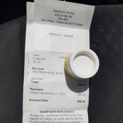 IdentoGo - Receipt $85 for TSA precheck enrollment. Chapstick Covering up my info lol