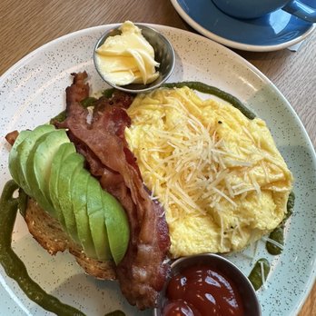 Bluestone Lane Houston Heights - Folded Chimichurri Eggs & Bacon Toast with added avocado - Coffee & Tea Near Me - Houston, Texas Bluestone Lane Houston Heights - Folded Chimichurri Eggs & Bacon Toast with added avocado - Coffee & Tea Near Me - Houston, Texas