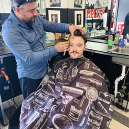Eli using straight razor on the lines