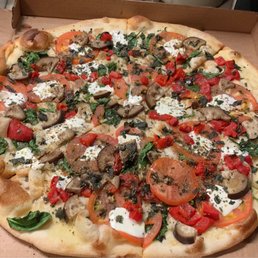 This is a Dicaprio pizza to which I added eggplant, roasted red peppers and spinach. I'd probably skip the eggplant next time.