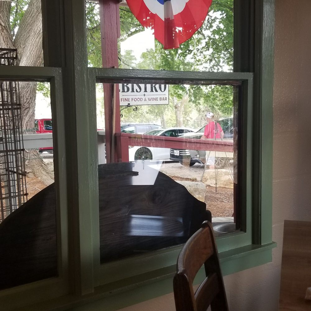 Backyard Bistro - View of front porch from dining room - American Near Me - Pipe Creek, Texas