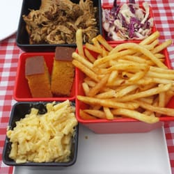 Pit Boss American BBQ & Eats - Nice little plate for 2. Pulled Pork, Coleslaw, Chips, Corn bread and an extra side of Mac and Cheese