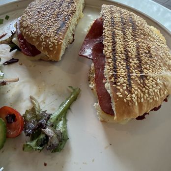 LeVant Dessert - Pastrami cheese sesame bread, sandwich with salad - Desserts Near Me - Menlo Park, California