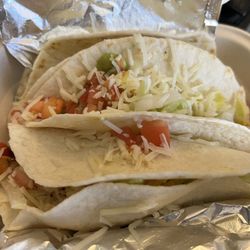 Guzman y Gomez - Standard take out tacos. If you order more than 2 they get stacked, so the bottom one will be extra soggy.
