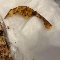 Urban Masala - I hope the human garbage can who took a bite out of our garlic naan choked on it.