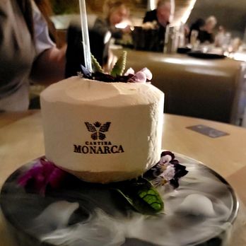 Cantina Monarca - A very tasty drink in a coconut. - Cocktail Bars Near Me - Bellevue, Washington Cantina Monarca - A very tasty drink in a coconut. - Cocktail Bars Near Me - Bellevue, Washington