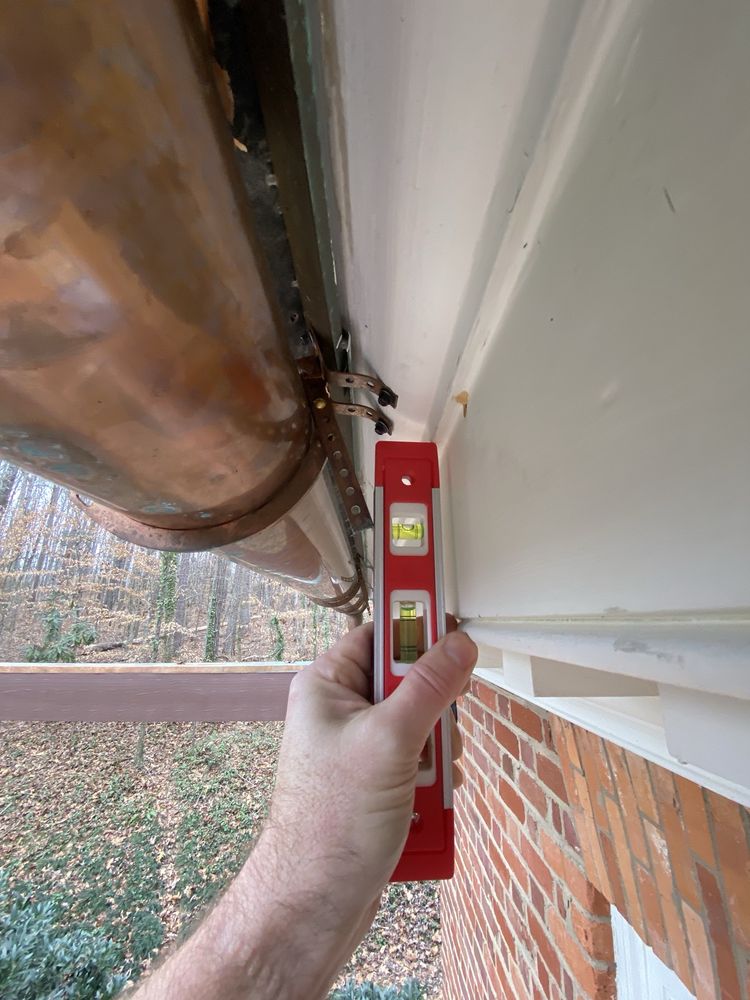 Slide of Guy Roofing