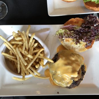 Northeast Social - Meaty, juicy burger with cheddar cheese and fries. - New American Near Me - Minneapolis, Minnesota Northeast Social - Meaty, juicy burger with cheddar cheese and fries. - New American Near Me - Minneapolis, Minnesota
