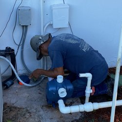 Dan's Services - Dan's technician installing new pump