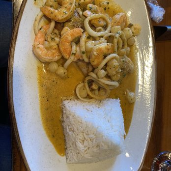 Kiko's Peruvian Kitchen - Pescado a lo macho( mahi mahi, creamy seafood sauce of shrimp, bay scallops and calamari rings, with white rice.) - Peruvian Near Me - Oaklyn, New Jersey