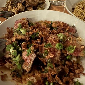 Nancy's Hustle - grilled NY strip, beef fat sticky rice, fermented chili beurre blanc & crispy shallot - New American Near Me - Houston, Texas Nancy's Hustle - grilled NY strip, beef fat sticky rice, fermented chili beurre blanc & crispy shallot - New American Near Me - Houston, Texas