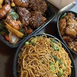 dragon and phoenix (left), orange chicken (right), and veggie lo mein (bottom) dragon and phoenix (left), orange chicken (right), and veggie lo mein (bottom)