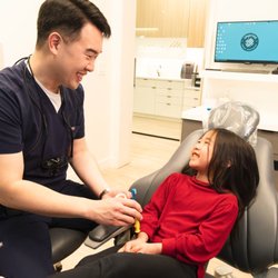 Imprint Family Dentistry - Dr. Lee with one of our adorable patients!