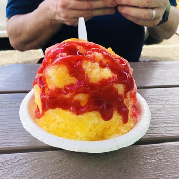 Maui's Beach House - Mango tango: strawberry n mango drizzle syrup over mango shaved ice. - Beach Equipment Rentals Near Me - Lahaina, Hawaii Maui's Beach House - Mango tango: strawberry n mango drizzle syrup over mango shaved ice. - Beach Equipment Rentals Near Me - Lahaina, Hawaii