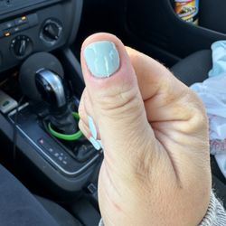 Crystal Nails Salon - Uneven edges, look towards cuticle.