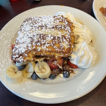 Lena's Kitchen - French Toast stuffed with Nutella, strawberries, bananas, and blueberries. - Breakfast & Brunch Near Me - Wixom, Michigan