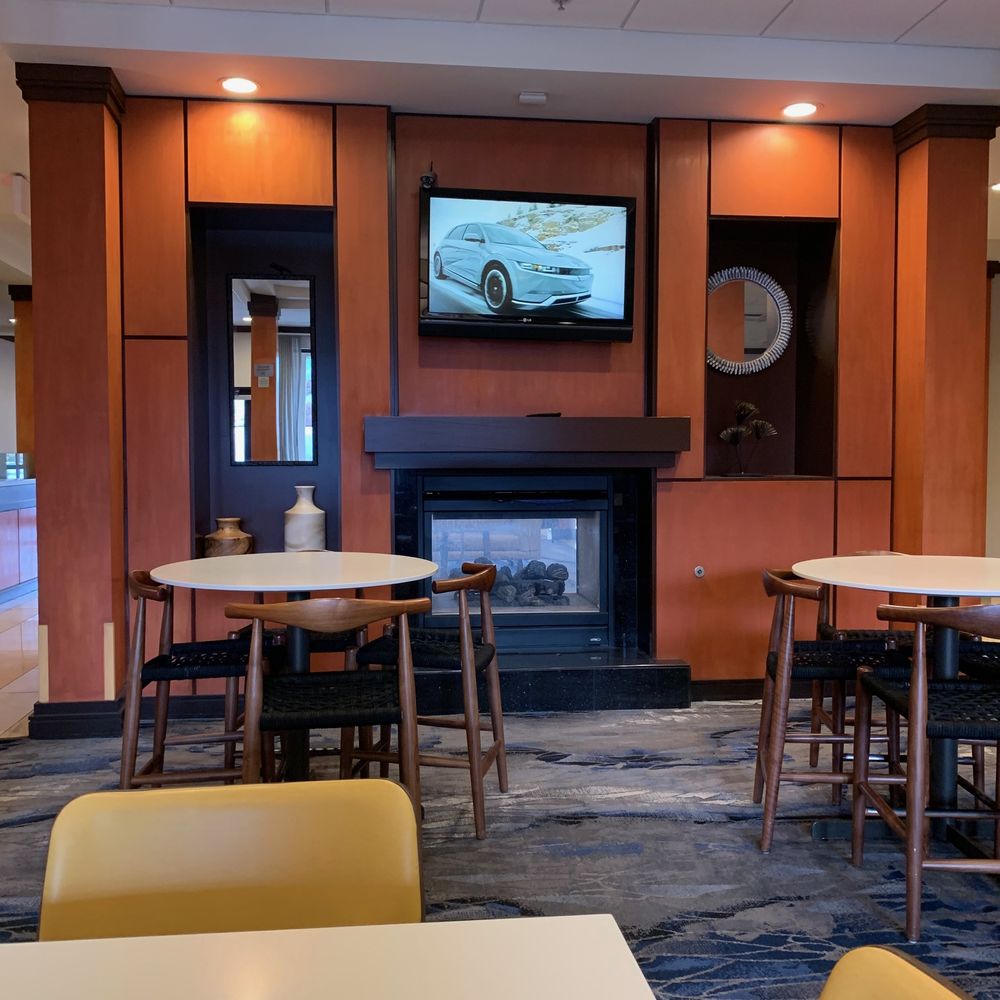 Fairfield by Marriott Inn & Suites Tehachapi - Lobby Fireplace from the eating area. (Unlit the entire time we were there). - Hotels Near Me - Tehachapi, California Fairfield by Marriott Inn & Suites Tehachapi - Lobby Fireplace from the eating area. (Unlit the entire time we were there). - Hotels Near Me - Tehachapi, California