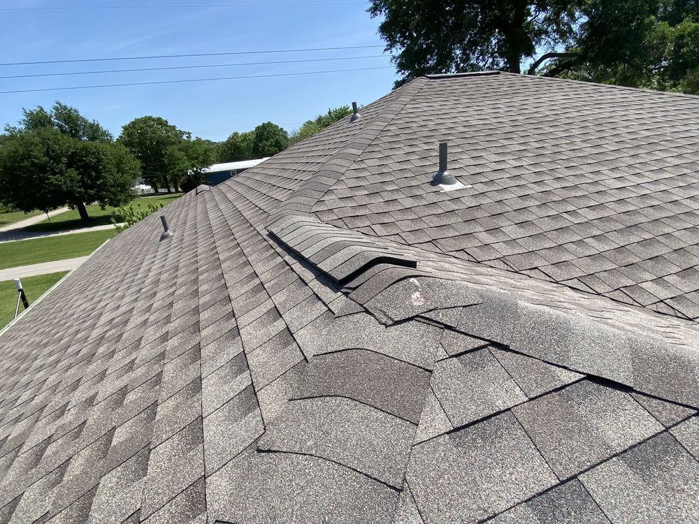 Slide of Holguin Roofing & Exteriors