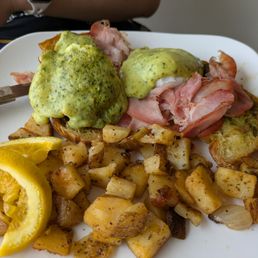 Italian benedict with traditional homefries