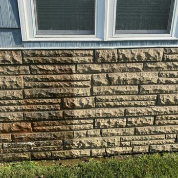 Smith’s Window Cleaning - Pressure washing 30 years of dirt and grime off brick - Window Washing Near Me