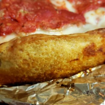 Lou Malnati's Pizzeria - The tasty crispy buttery crust. - Pizza Near Me - Third Lake, Illinois