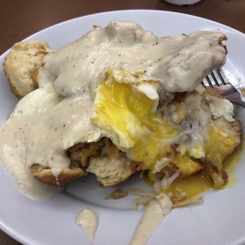 The Roost Cafe - The Bulldog! Biscuits with bacon, eggs, hash browns and a chicken fried steak smothered in gravy. - Diners Near Me - Eustace, Texas