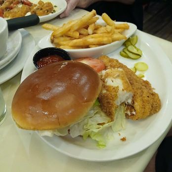 Lucky's Steakhouse - Fried fish sandwich with fries - Steakhouses Near Me - Midland, Michigan Lucky's Steakhouse - Fried fish sandwich with fries - Steakhouses Near Me - Midland, Michigan