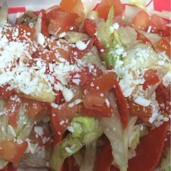 Elote Factory - a plate of food with lettuce and tomatoes - Mexican Near Me - Eagle Pass, Texas Elote Factory - a plate of food with lettuce and tomatoes - Mexican Near Me - Eagle Pass, Texas