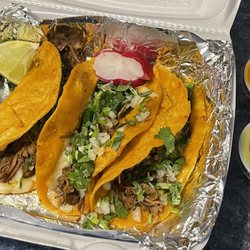 La Aventura Tortas Y Antojitos - Quesabirria tacos and sauces.