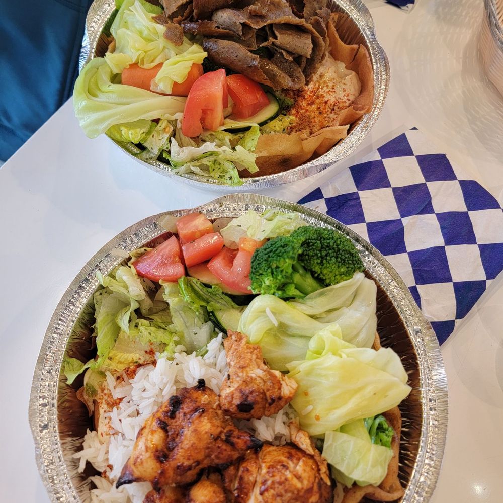 The Hummus Factory - Gyro Bowl and Chicken Bowl(both have steamed cabbage, broccoli and carrots, a salad, hummus, rice, and a fried Pita shell on the bottom) - Mediterranean Near Me - Downey, California The Hummus Factory - Gyro Bowl and Chicken Bowl(both have steamed cabbage, broccoli and carrots, a salad, hummus, rice, and a fried Pita shell on the bottom) - Mediterranean Near Me - Downey, California