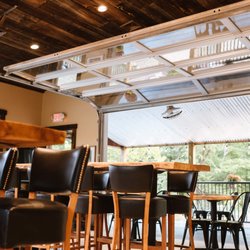 Ginny's Neighborhood Pizza Joint - Open air dining room.