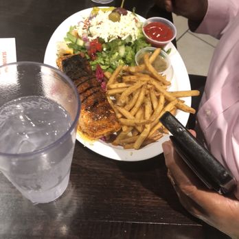 Odeh’s Mediterranean Kitchen - Salmon with Greek Salad and rosemary Fries - Mediterranean Near Me - High Point, North Carolina Odeh’s Mediterranean Kitchen - Salmon with Greek Salad and rosemary Fries - Mediterranean Near Me - High Point, North Carolina