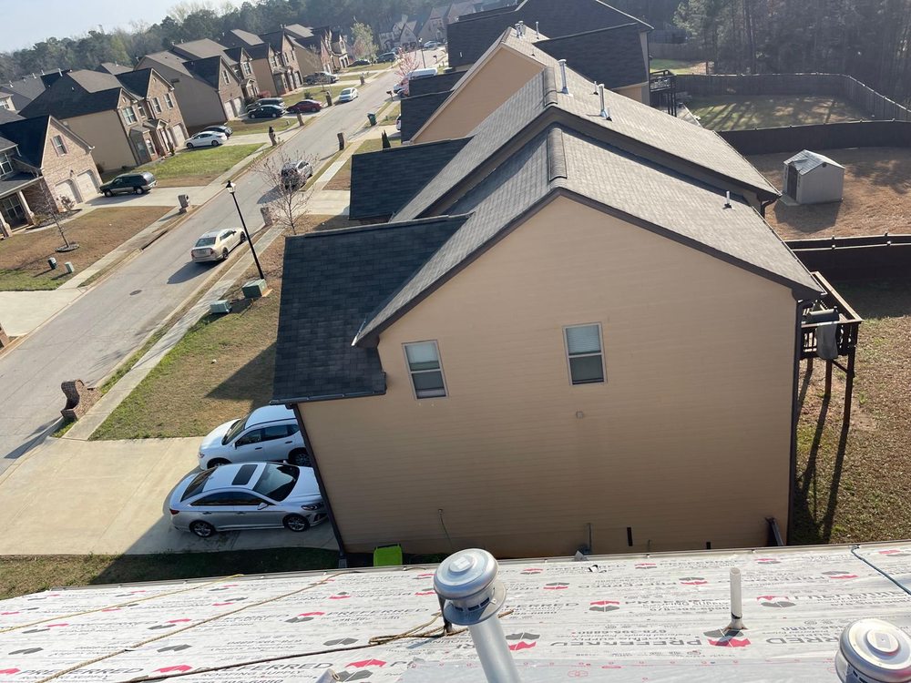 Slide of Umana Roofing