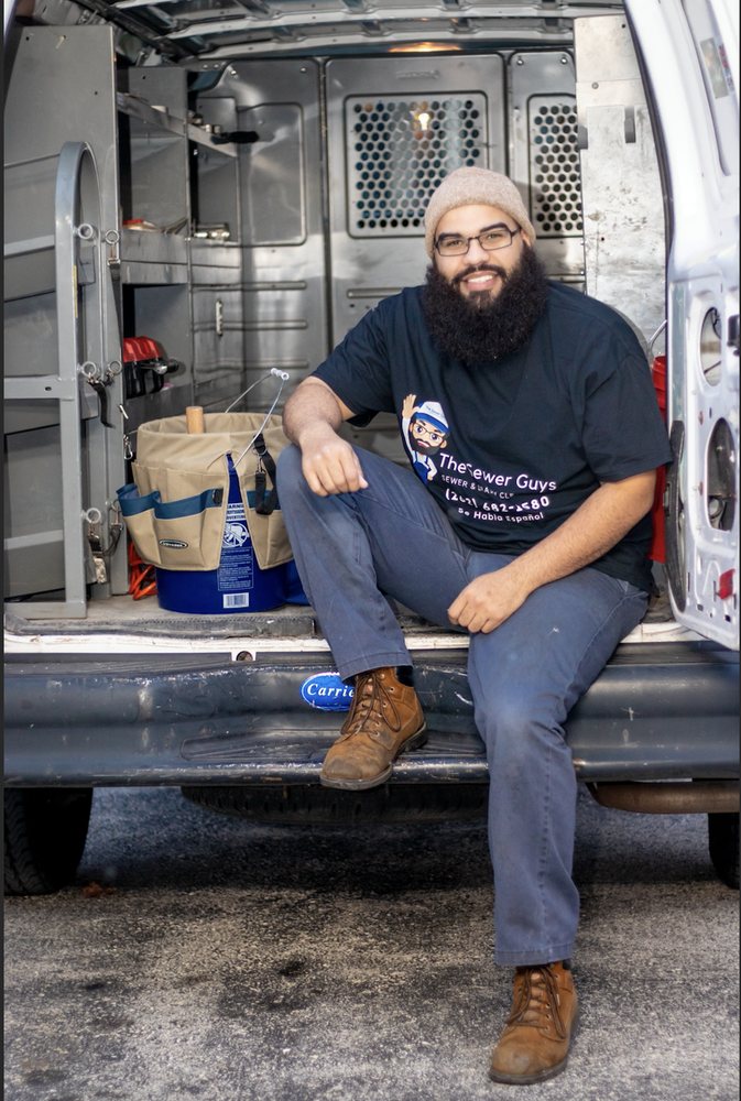 Slide of The Sewer Guys