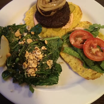 Veganized - Savory mushroom lentil burger with smoky eggplant and a side of sauteed kale topped with hazelnuts. - Vegan Near Me - New Brunswick, New Jersey Veganized - Savory mushroom lentil burger with smoky eggplant and a side of sauteed kale topped with hazelnuts. - Vegan Near Me - New Brunswick, New Jersey