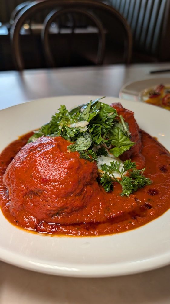 Murray's Pizza & Wine Logo