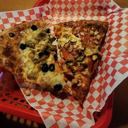 Lynx Creek Pizza - Pizza by the slice: The Lynx on the left, and Milepost 238.5 on the right